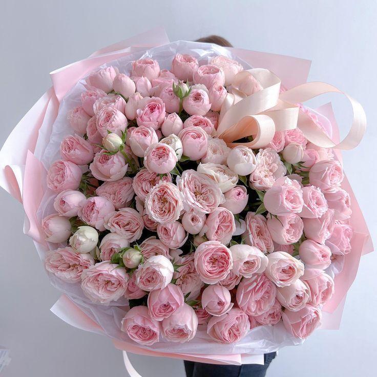 Corporate meeting room with carefully timed floral arrangements that maintain elegance throughout business hours